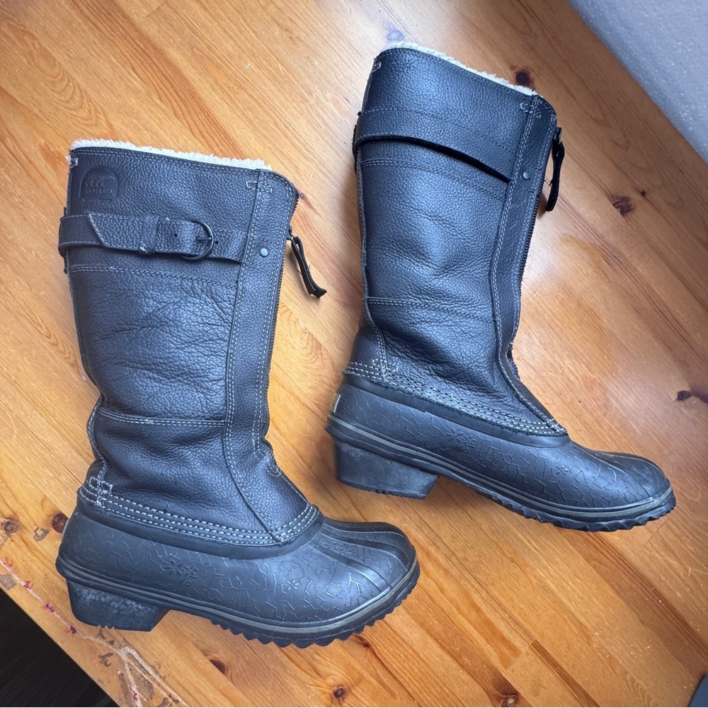 Sorel high black winter boots size 7 fleece lined